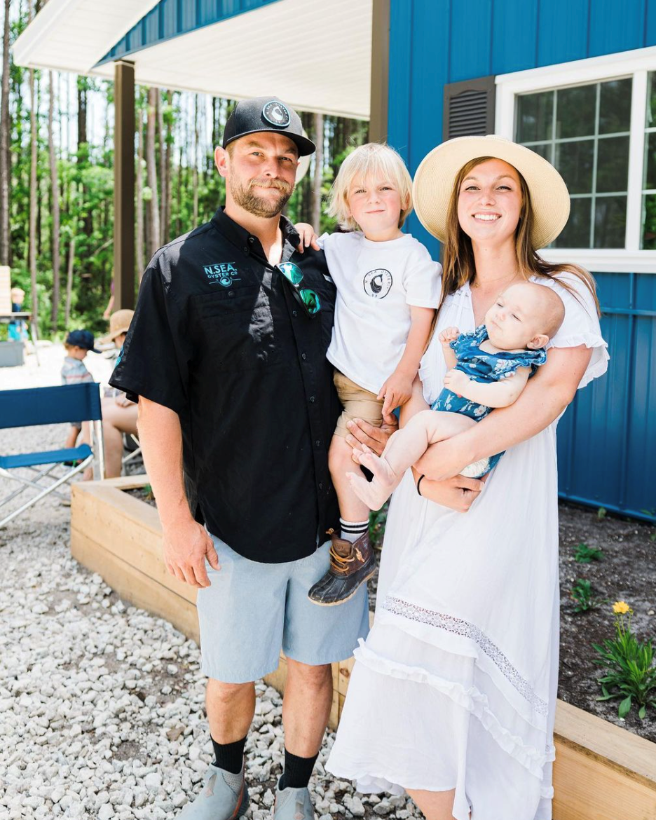 N.Sea Oyster Co. family farmers, Connor and Alyssa MacNair with son Finn and daughter, Sage, in Hampsted, North Carolina.